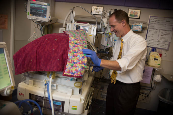 Christian Con Yost, M.D., associate professor of pediatrics at the University of Utah School of Medicine in the neonatal intensive care unit (NICU)