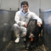 PhD Student Yaolei Zhang, DTU Bioengineering, with the Ossabaw pig Donna in the BioFacility stables at DTU Risø Campus.