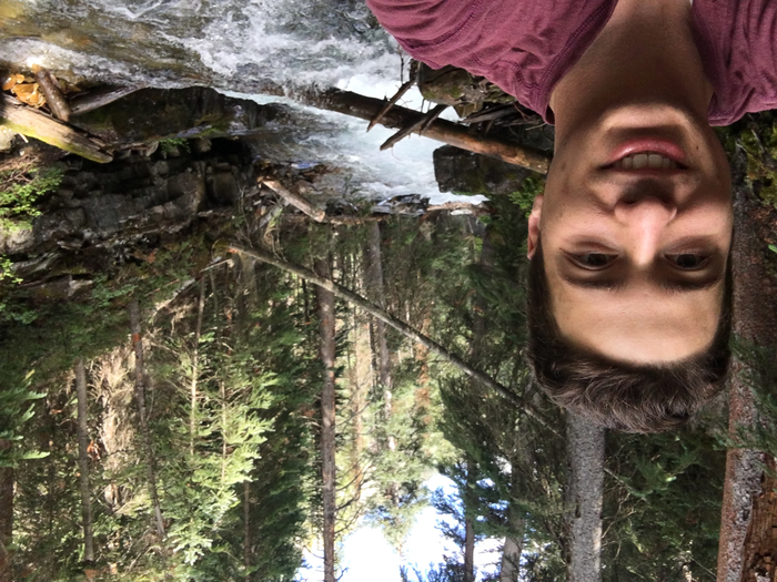 Brian Saccardi collecting stream data from the East River watershed, Colorado