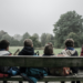 Children sitting on a bench.