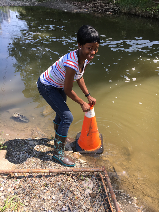 Tife Awonaike collecting samples