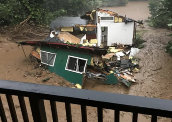 Home destroyed by floodwaters
