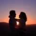 A silhouette of a couple standing together.