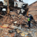 Researcher uses Tobii eye-tracking glasses to assess damages in row buildings in Mayfield, Kentucky after the region endured tornadoes