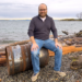 Malloy with the oil drum used for his musical performances