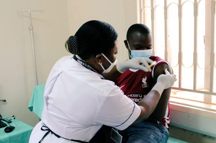 First enrolled volunteer to the PrEPVacc clinical trial receiving an injection