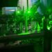 Green laser light is used to manipulate the energy states of barium ions