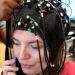 University of Houston researcher Stacey Gorniak dons the neuroimaging device used in the study