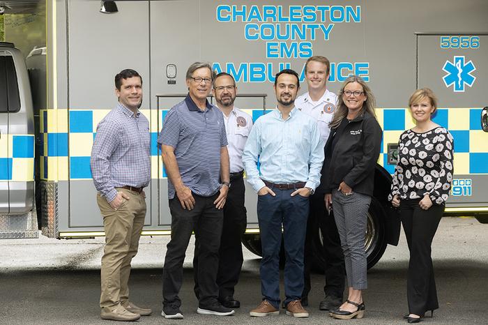 Members of the  research team working to equip ambulances with MRIs