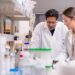 Pankaj Karande, left, and Carolina Catarino in the lab