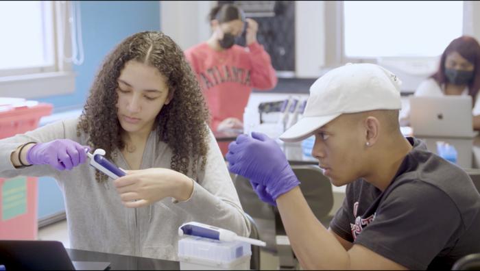 UMass students getting hands-on lab experience. The Driving Change initiative will expand these sorts of opportunities at the University.