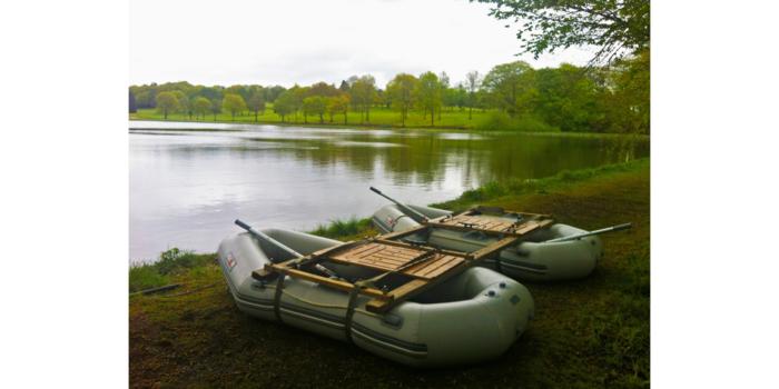 Sampling boats on the bank of the lake.