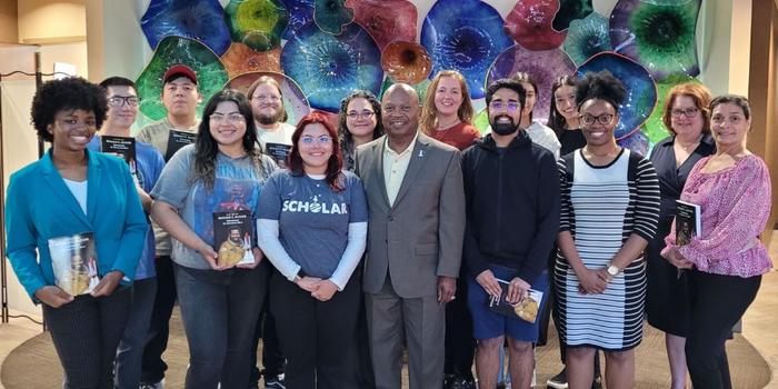 Some of the McNair Scholars standing with Ronald McNair's brother Carl in October 2023