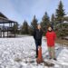 Aaron Goodarzi (left) and Henk de Haan stand at the well head on De Haan's property.