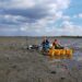 Taking water samples from the erosion experiment in the Oosterschelde. In the photo Alena di Primio and Dunia Rios-Yunes.