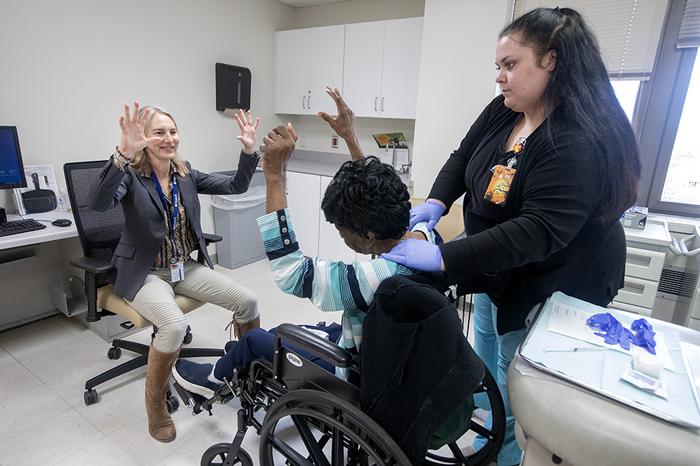 Dr. Vanessa Hinson of the Medical University of South Carolina assessing a Parkinson's disease patient