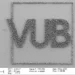 AFM image of microparticles printed in the controlled shape of the VUB logo. The scale is 100µm, the thickness of a human hair.