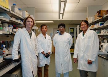 Owens and team at JABSOM lab