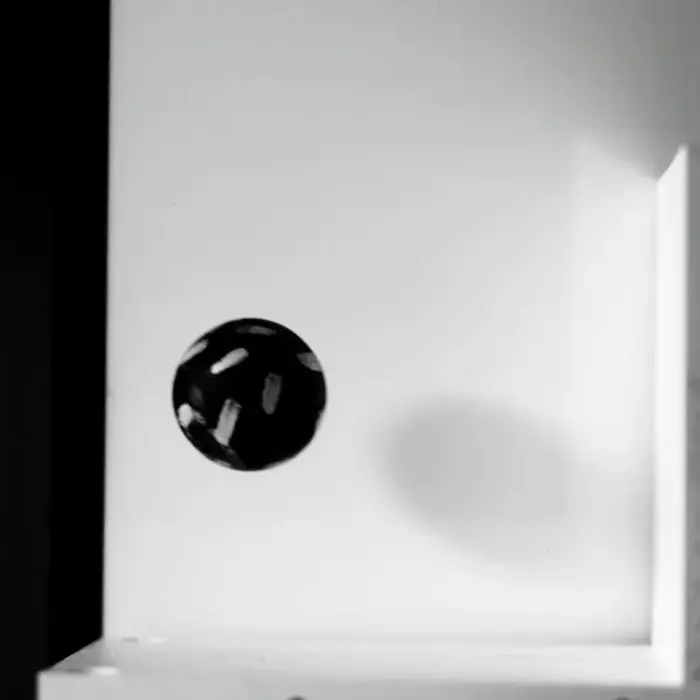 Physics of the nick shot in squash