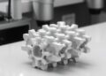 Interface Strategy Drives Multi-Scale Hybrid Additive Manufacturing