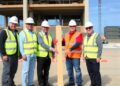 Construction Milestone Celebrated in Special Ceremony
