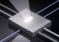 Metal-Integrated Grating Electrode Enables Near-Perfect IR Transmission