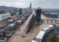 Redlined U.S. neighborhoods face disproportionate exposure to extreme flood risks