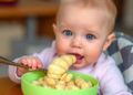 Breastfed Infants’ Bacterial and Metabolic Profiles Shift During Transition to Solid Foods