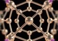 Flux-driven ligand exchange reshapes metal–organic framework glasses
