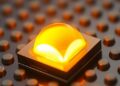 In-place dry repair and passivation deliver size-independent performance in III-nitride micro-LEDs