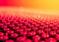 Graphene Flakes Supercharge Liquid Crystal Optics in the Infrared