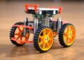 New spring-based jumping mechanism designed for wheeled jumping robots