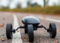 Obstacle-aware event-triggered formation control for nonholonomic mobile robots