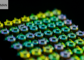 Raman Spectral Overtones Reveal NiO2, Not NiOOH, on Nickel Anodes