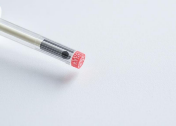 Carbon Dots That Dim on Cue Turn Vitamin B12 Testing Into Paper and Swab Sensors