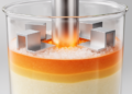Two L-shaped fins optimize Lauric-acid storage cycle in simulation