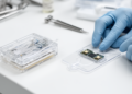 Research report: Translational Barriers and AI‐Driven Challenges of Microfluidics‐Enabled Wearables and Implantable Systems in Personalized Medicine