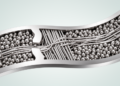 Ultrafine titanium retains ductility through a slip-system transition