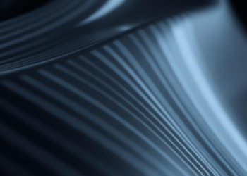 Experimental study links graphene wrinkle sharpness to strong flexoelectric response