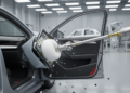 High-speed impactor tests mirror passenger airbag door opening only in early phase