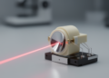 Tiny piezoelectric mirror steers and refocuses light at microsecond speeds
