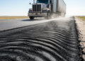 Heat and Heavy Trucks Team Up to Warp Asphalt Roads in Nonlinear Ways