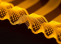 Chemists Rebuild Kevlar Nanofibers Into Films That Conduct Heat, Block Interference, and Survive 10,000 Folds
