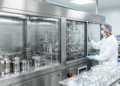 Automated cGMP Production of [11C]NOP-1A PET Radioligand Validated for Human Use
