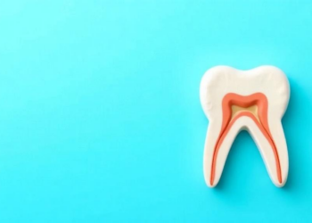 Rare Low-Grade Sinonasal Cancer Diagnosed After Gum Mass and Loose Tooth