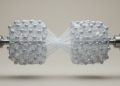 Magnesium Twins Caught Merging and Stalling in Live Tensile Test