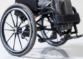 Smart Wheelchair Control System Recovers From Extreme Tilts by Switching Between Two Controllers