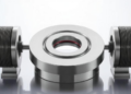 Magnetic Bearing Resonator Shatters the Thermodynamic Limit of Low-Frequency Sound Absorption