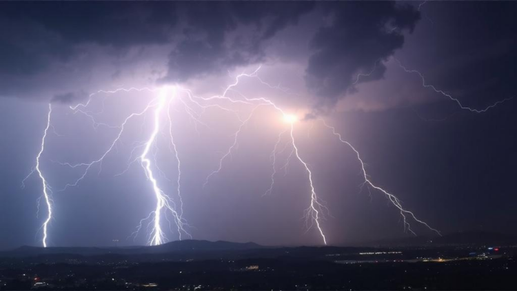 How Big, Bright Flashes Make More Pollution: Lightning's Nitrogen Footprint Measured From Space
