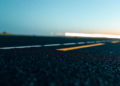 Neural Networks Learn to Trust Their Data: Uncertainty-Weighted AI Predicts Asphalt Density